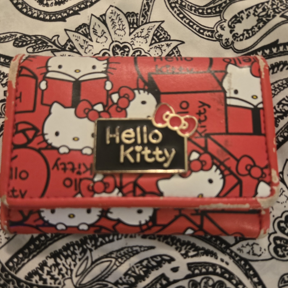 Peoject Piece - Wear And Tear. Hello Kitty Red Wallet